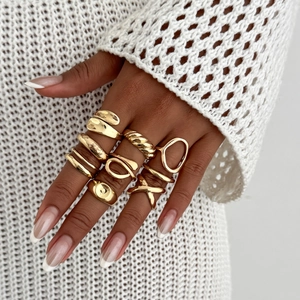 Set de 9 bagues de phalange dorées avec motifs de lave liquide et torsades chic