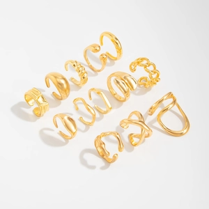 Détails d'un lot de 10 bagues empilables dorées et bagues d'oreilles aux motifs variés
