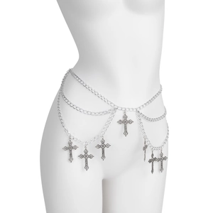 Detail shot of gothic multi-layer silver waist chain with vintage cross pendants on model