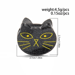 Détails d'une pince à cheveux chat noir à paillettes avec dimensions et poids