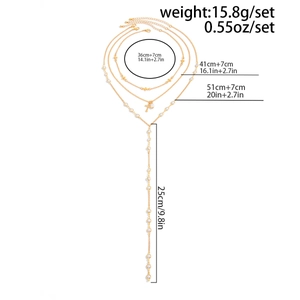 Detailed size chart for layered gold necklace set with cross and star charms