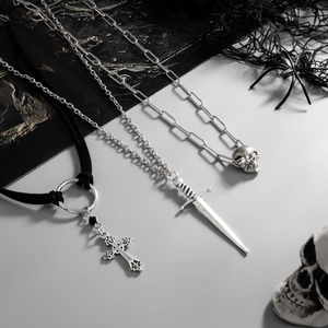 Gothic silver necklaces set featuring cross, sword, and skull pendants with a retro finish