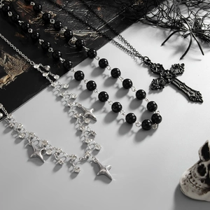 Gothic beaded cross necklace with shimmering star zircon accents and dark aesthetic details