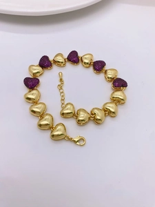 Bracelet cœur classique plaqué or 18 carats avec pierres en zircon rose foncé