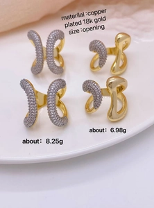 Detail of 18k gold plated adjustable rings with micro-set shimmering cubic zirconia stones