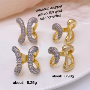 Set of four 18K gold plated copper adjustable rings with pave cubic zirconia accents