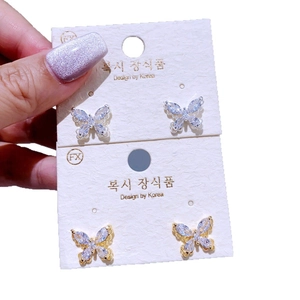 Elegante Schmetterling-Ohrstecker mit Zirkonia-Inlay in Silber- und Gold-Optik