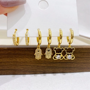 Gold-plated hoop earring set with micro-pave zircon, Hamsa hand, and bear charms