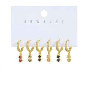 Detail of micro-paved zircon gold earrings with six different colored gemstone pendants