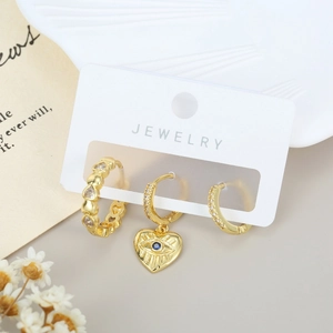 Dreiteiliges 18K vergoldetes Ohrring-Set mit Zirkonia und Herz-Anhänger mit Auge