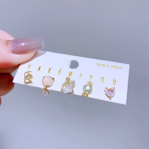 5-piece set of sweet heart and swan stud earrings with zircon crystals on display card