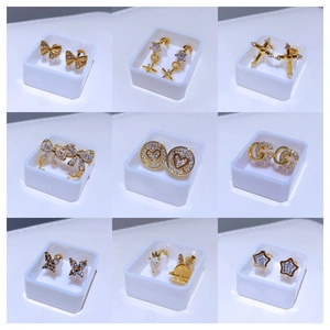 Ohrstecker-Set aus Titanstahl mit Zirkonia, Schmetterling-, Herz- und Kreuzdesign