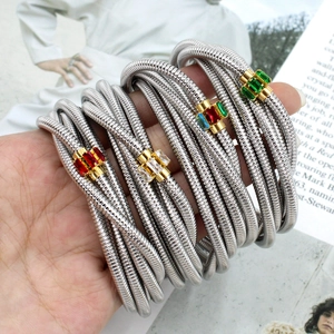 Multi-layer spiral bracelet with colorful zircons in silver and gold metal finish