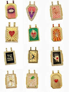 Collection of 12 gold-plated tarot pendants with enamel and zircon detailing
