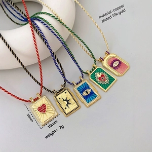 Set of tarot-style enamel pendants in 18K gold plated brass with micro-inlaid cubic zirconia