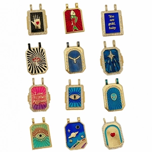 Tarot style enamel pendants set with diverse motifs and sparkling zircon borders