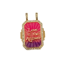 Gold Tarot pendant with Love is the Answer engraving and crystal border