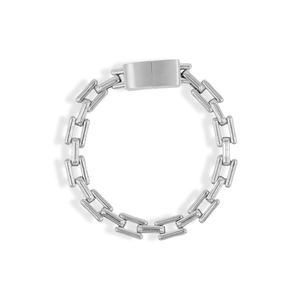 Detailed macro of silver rectangular link chain bracelet with a matte metal buckle clasp