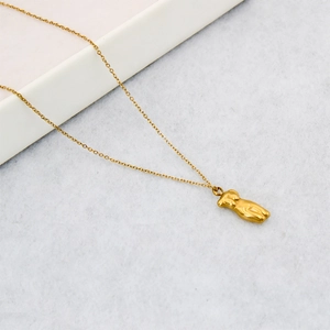 Elegant 18K gold-plated necklace featuring a female torso artistic pendant on a link chain