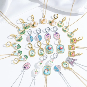 Freshwater pearl necklace with enamel flower pendants and matching gold earrings set