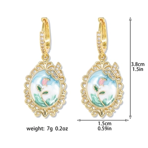Detail view of floral enamel earrings showing dimensions 3.8cm height and 7g weight