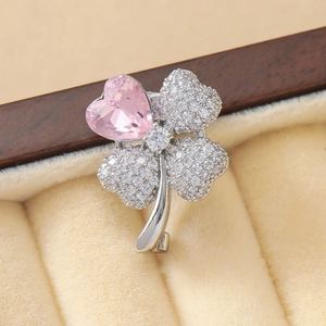 Elegant four-leaf clover brooch with pink heart gemstone and pavé zircon stones