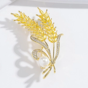 Golden wheat ear brooch with yellow zircon and white pearl on elegant metal base