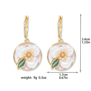 Detailed view of floral enamel earrings with freshwater pearls and dimensions shown