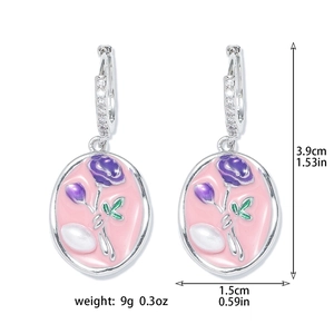 Detail view of pink enamel flower earrings with freshwater pearls and dimensions