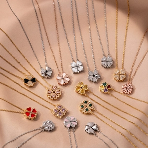 Rotating four-leaf clover heart necklaces in emerald green and zircon gemstone sets