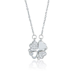 Macro detail of silver clover pendant with heart-shaped sparkling cubic zirconia