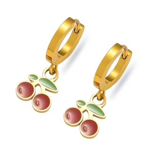 Detailed close-up of cherry drop earrings made of titanium steel with gold-plated finish
