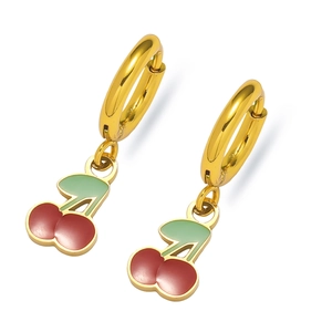 Detailed view of red enamel cherry pendant earrings with golden hoops on white background