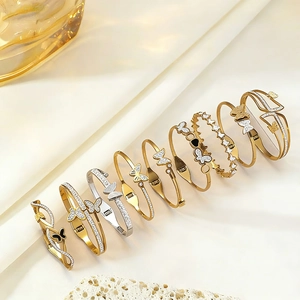 Fashion titanium steel butterfly open bangles with zircon and shell accents in gold and silver