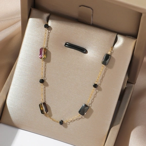 Titanium steel necklace with black agate and colored gemstone beads in a gold box
