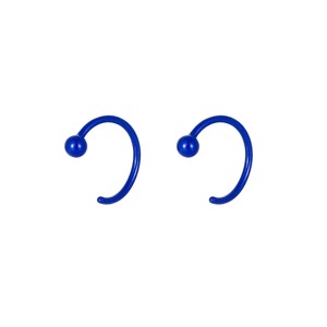 Royal blue ceramic C-shape earrings with smooth finish on a white background