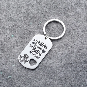 Stainless steel keychain with hollow heart and engraved inspirational sisterhood quote