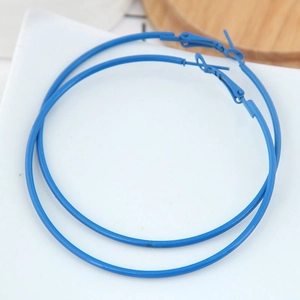 Minimalist large round hoop earrings with matte blue finish in a classic circular design