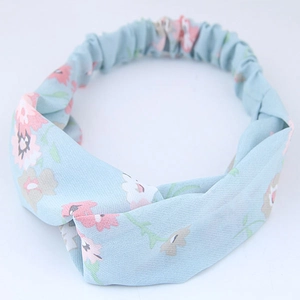 Elastic floral cross twist knot headband for women in light blue chiffon fabric