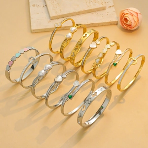 Herz-Armbänder aus Titanstahl mit Zirkonia und Perlmutt in Gold und Silber-Optik