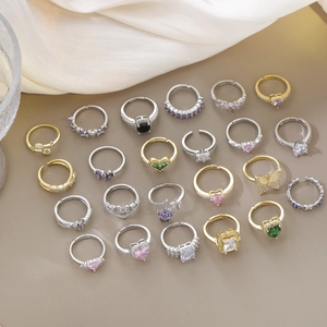 Collezione di anelli aperti con cuore e farfalla in zircone finiture oro e argento