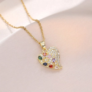 Golden heart necklace with multicolor gemstones and micro-pave crystals on silk