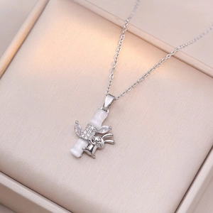 Women's bamboo heart pendant necklace with shiny stones and a cute metal rabbit charm