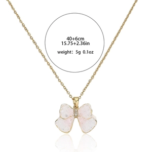 Titanium steel heart necklace with golden bow pendant and light pink ice-cracked texture