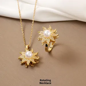 Set gioielli con collana e anello fiore rotante con perle e zirconi in finitura oro