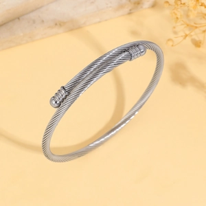 Silver twisted cable open bangle for women made of durable stainless steel with ball ends