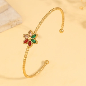 Gold-plated floral bangle with multi-color marquise stones and diamond texture