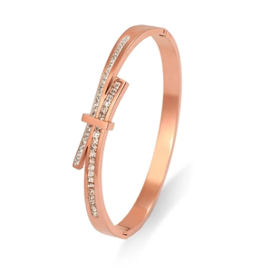 Elegant rose gold geometric bangle for women with micro-pave crystals in crossover design