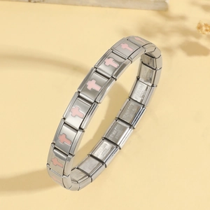 Polished stainless steel modular charm bracelet with a pink cross enamel design