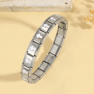 Detail of silver stainless steel Italian charm bracelet with modular cross links
